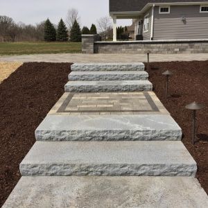 Unilock Ledgestone steps (grey color) installed in Mount Pleasant.
