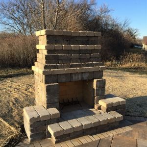 County Materials Summit Stone block fireplace in haven color with hush accents. Installed in Mount Pleasant, WI.