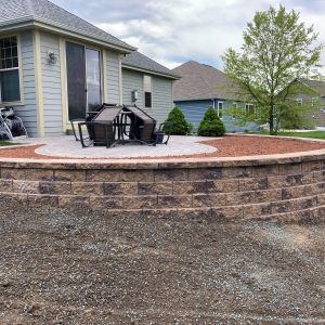 County Materials Tribute block (canyon brown color) installed around a patio in Caledonia, WI