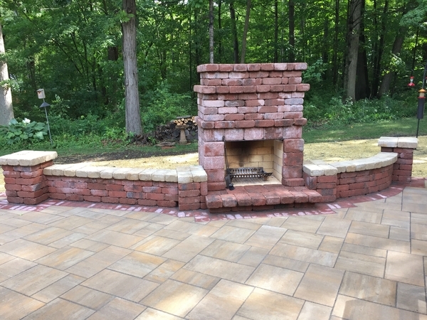 outdoor brick fireplace and grill