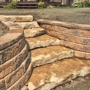 Rustic gold outcropping stone steps installed in Caledonia.