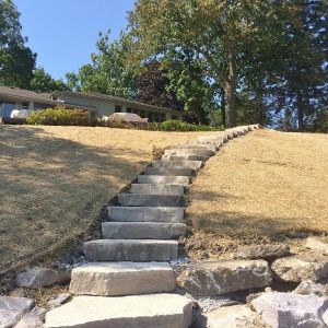 White lannon steps installed down bluff to Lake Michigan in Mount Pleasant.