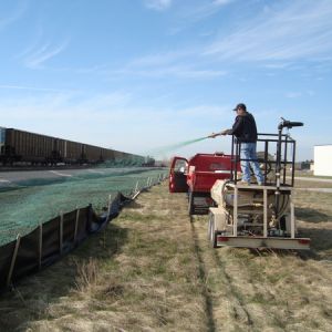 Our installer operating a hydroseeder machine at a Racine railroad site.