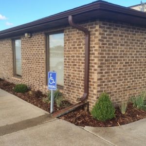 Shrubs and perennials are added in front of the Topper Industrial offices in Sturtevant.