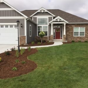 New plantings and shredded hardwood mulch beds added to new home in Mount Pleasant.