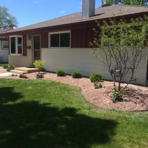 New plants and crushed brown granite stone freshen the landscape at this home in Racine.