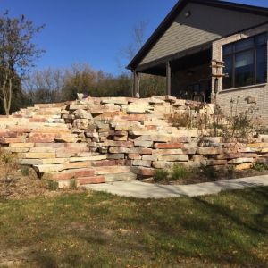 Retaining wall and steps made of Chilton and Fond du Lac outcropping stones in Raymond, WI