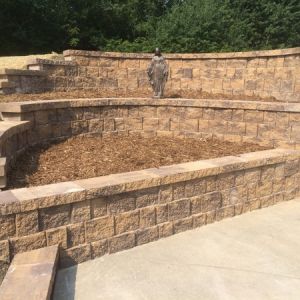 A tiered retaining wall made of County Materials StoneWall Select in Somers, WI.