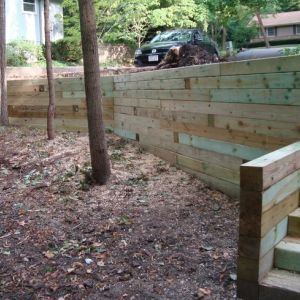 6" x 6" treated timbers are another choice for retaining wall material. Racine, WI