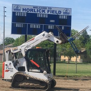 Fine grading and installing sod in Racine at Horlick Field baseball diamond.
