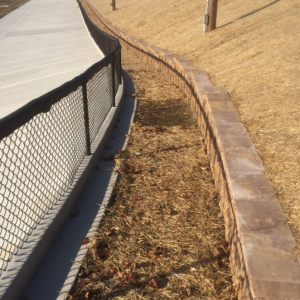 Final grading, seeding and block retaining wall around Washington Park Velodrome.