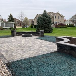 County Materials Grand Vantage paver patio (majestic color) with 4"x8" Elements border (reflection color) installed in Mount Pleasant, WI